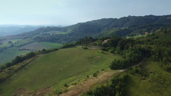 Drone Aerial Flight Over Green Forests in Tuscany, Italy