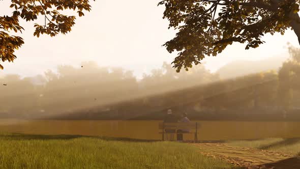 Senior Couple Relaxing In The Autumn Sun alt