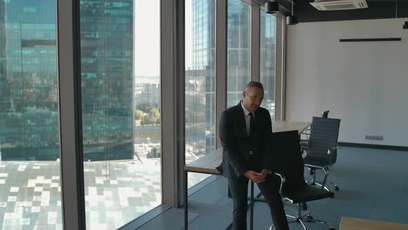 Businesspeople Moving To New Office, Packing Boxes, Smiling.