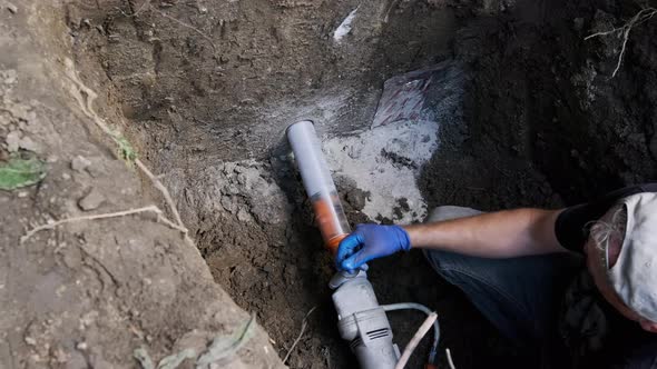 Close Up Footage of Diamond Drilling Machine Hole in the Concrete in Home