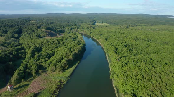 Drone flight above a wide river