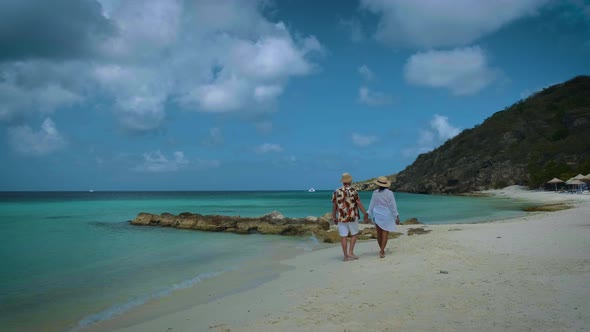 Couple Men and Woman Mid Age on the Beach of Curacao Grote Knip Beach Curacao Dutch Antilles