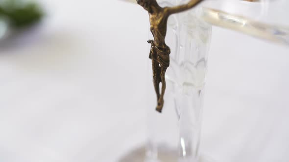 Close Up of Jesus Christ Statue at Table in Church