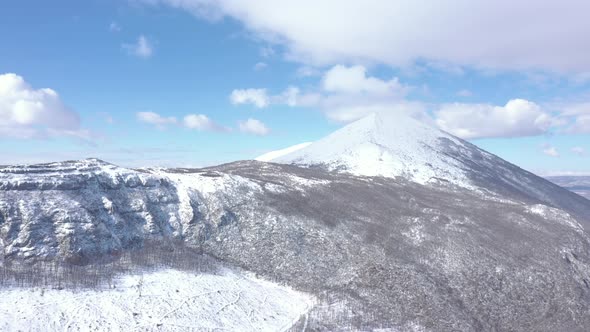 Rtanj mountain top under the snow 4K aerial footage