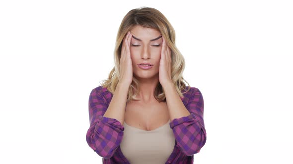 Portrait of Exhausted Lady with Long Hair Rubbing Temples Because of Headache Suffering From