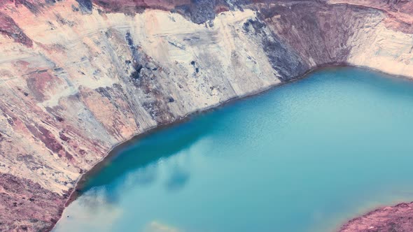 Azure Surface of the Lake in the Technological Clay Quarry  Aerial Shot