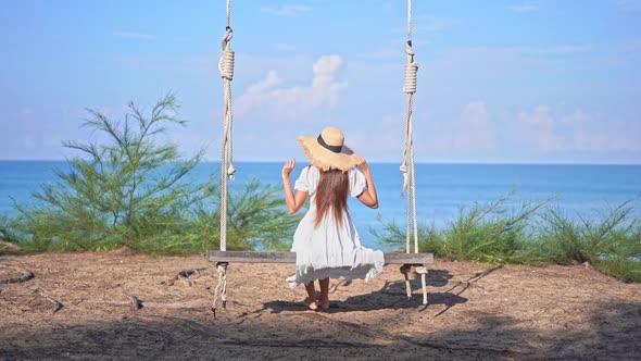 Asian woman enjoy around beautiful beach sea ocean