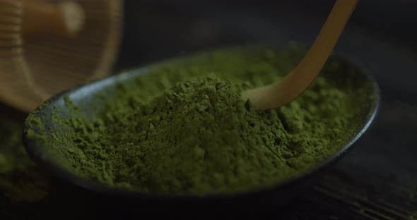 Traditional Bamboo Spoon with Matcha Closeup. Matcha Organic Green Tea. Matcha Tea Ceremony. Matcha