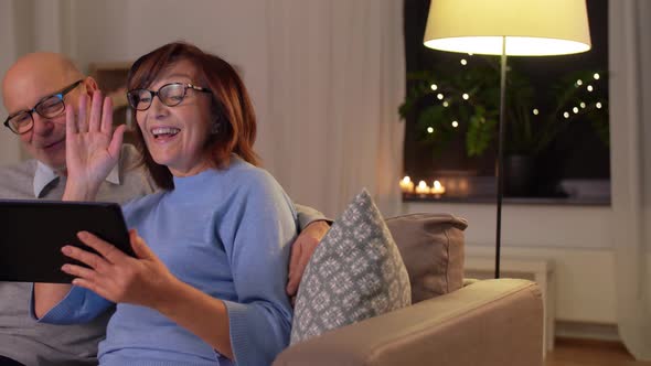 Old Couple with Tablet Pc Has Video Call at Home