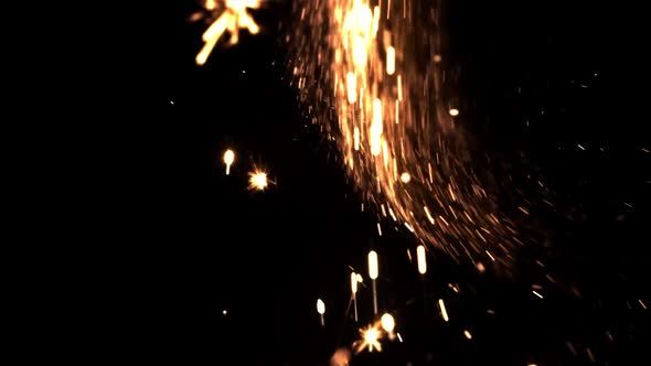 Super Slow Motion Bright Lights of Bergal Candles on a Black Background