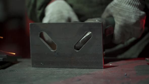 Close Up of Hand Man Work Wearing Gloves While Grinding Metal