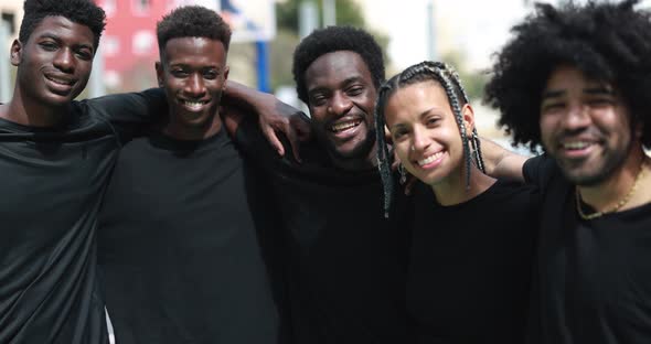 Group of young multiracial people smiling on camera