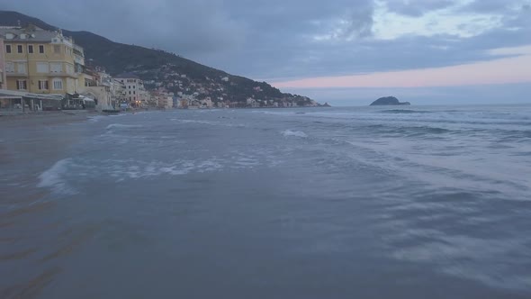 Gallinara island from Alassio coast in Liguria, Italy. Aerial view