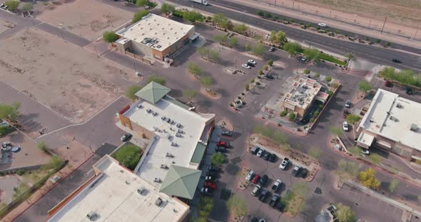 Aerial Top View of Typical a Avondale Small Town Shopping Center with Big Parking Lot a Major