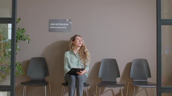 Female Candidate Waiting for Job Interview