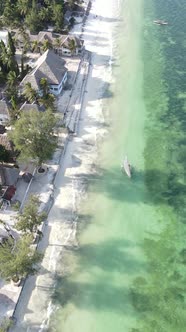 Vertical Video Boats in the Ocean Near the Coast of Zanzibar Tanzania