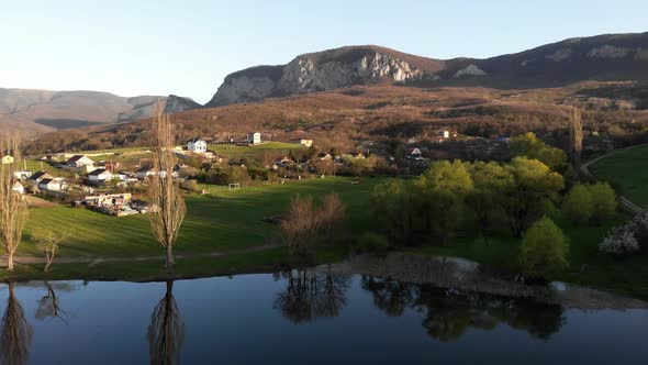 Nice Little Village in the Mountains Next to the Lake