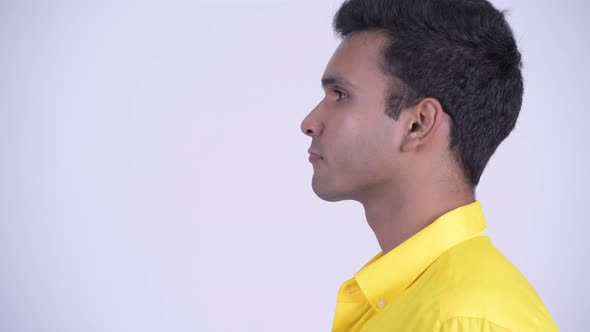 Closeup Profile View of Young Indian Businessman