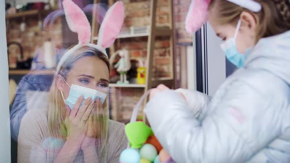 Video of girl showing mother an Easter eggs during quarantine. Shot with RED helium camera in 8K