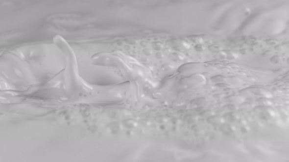 Pouring Fresh Milk in Super Slow Motion Shooted with High Speed Cinema Camera at 1000Fps alt