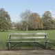 Couple holding hands, woman walking across benches - VideoHive Item for Sale