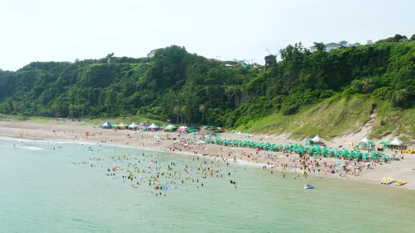 Beach landscape during summer vacation in Korea. Saekdal Beach in Jeju Island.