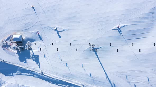 Top Down View of the Ski Lift and the Track in Winter Season