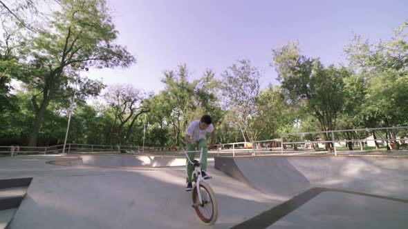 BMX Rider Doing Trick in Extreme Park and Falling Down Slow Motion