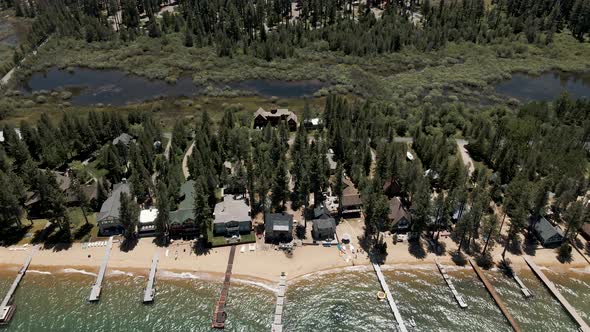4K Tahoe Lake cabins on the beach 
