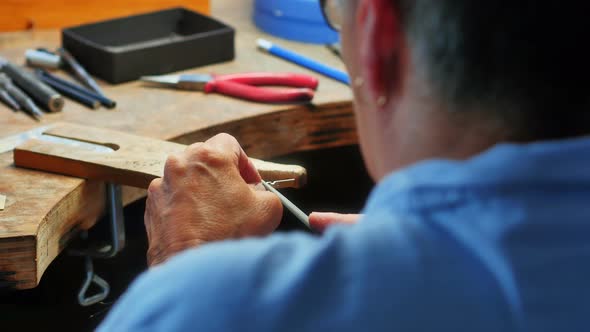 Craftswoman working in workshop