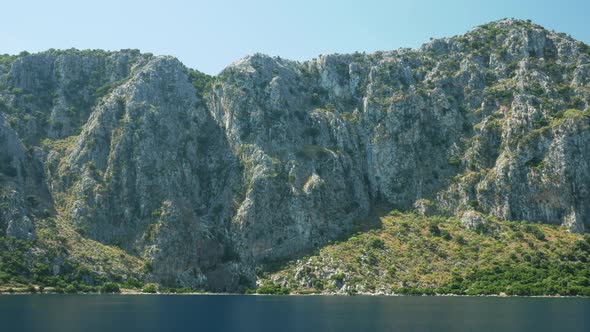 High cliffs in the sea bay