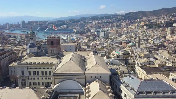 Aerial panoramic drone view of De Ferrari square, Ducal Palace, roofs of old buildimìngs