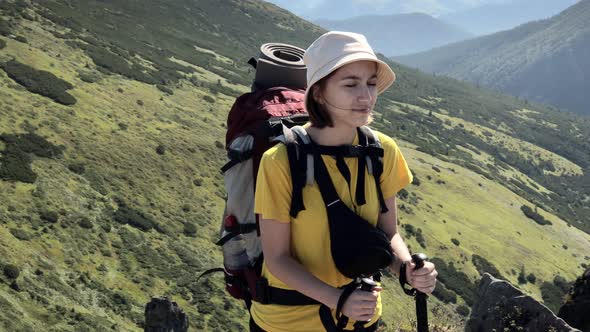 Woman Tourist walking on top of mountain. Hikers travel enjoy life scenic nature landscape