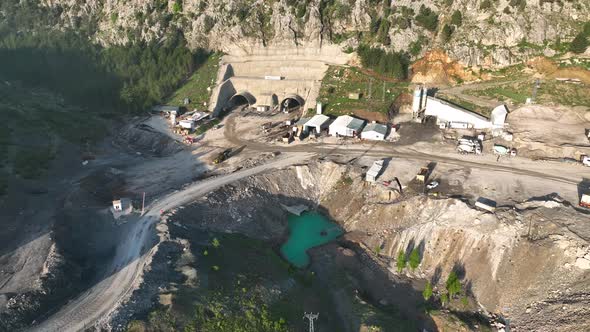 Tunnel development in the mountains aerial view 4 K