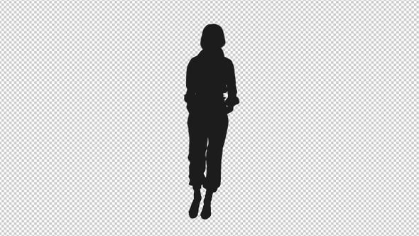 Silhouette Of Young Woman Walking Slowly With Hands In Pockets alt