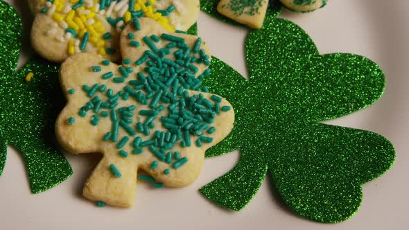 Rotating stock footage shot of St Patty's Day clovers on a white surface - ST PATTYS 012