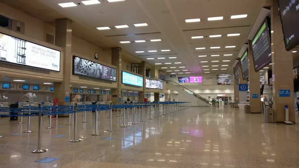 Static shot of empty check-in counters in the airport in Malta