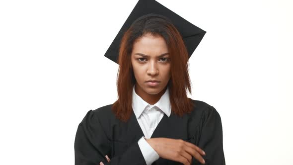 Strict Frown African American Female Graduate Pointing to Look Right Into Her Eyes Standing Over