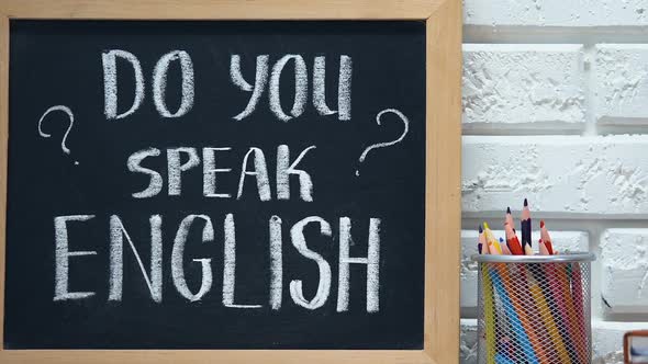 Do You Speak English on Blackboard, National Flag in Pen Cup, Language School