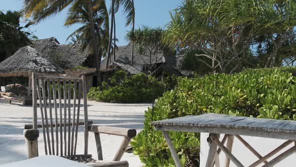 Tropical Hotel with Thatched Bungalows Palm Trees Exotic Beachfront