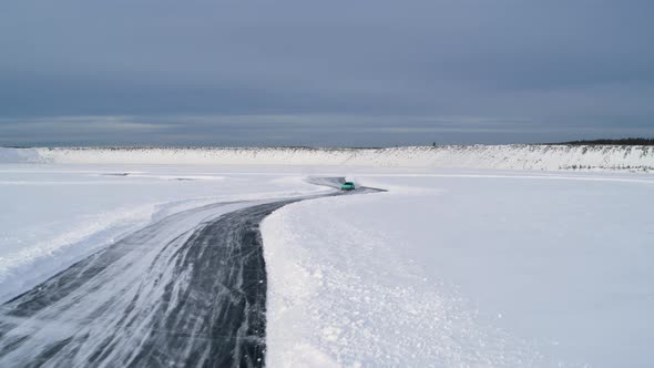 Aerial View of a Racing Car at an Ice Rally