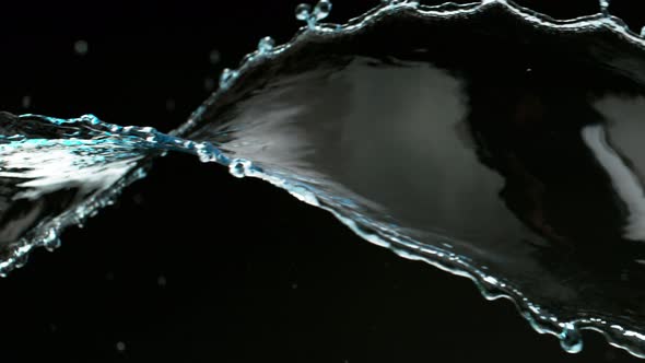 Super Slow Motion Shot of Spiral Water Splash Isolated on Black Background at 1000Fps