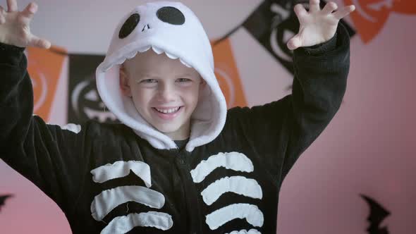 Halloween Kids Portrait Boy in Halloween Skeleton Costume at Home