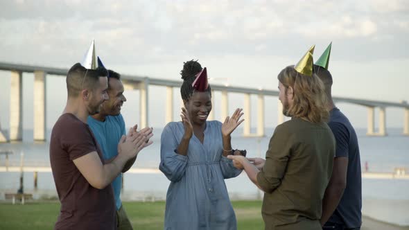 Funny Friends Celebrating Birthday in Paper Hats