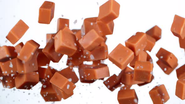 Super Slow Motion Shot of Salted Caramel Explosion Isolated on White Background at 1000Fps