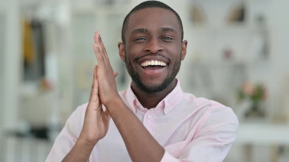 Portrait of Positive African Man Clapping, Appreciating 