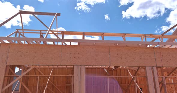 Timber Frame House of Wooden Beam Framework on Stick Built Home