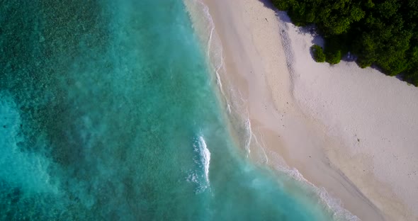 Wide angle above abstract view of a summer white paradise sand beach and blue ocean background in vi