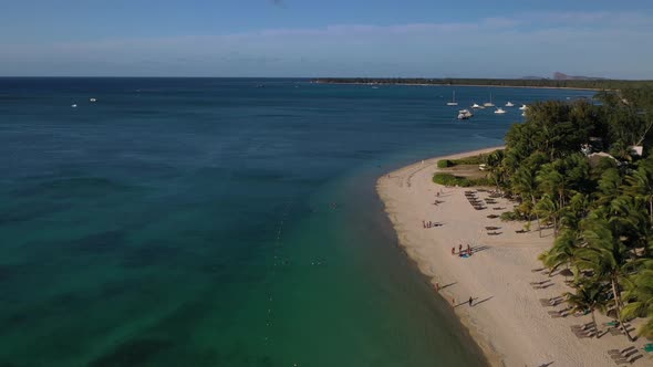 Beach Along the Waterfront and Coral Reef and Palm Trees, Mauritius, Africa, Pier Near the Beach of