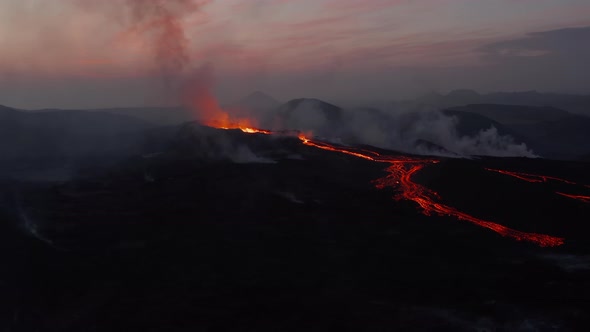 Descending Footage of Active Volcano at Dawn